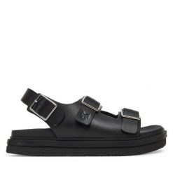 Sandały Calvin Klein Jeans. Czarne sandały damskie Calvin Klein Jeans, bez wzorów, z jeansu, bez obcasa, na płaskiej podeszwie, bez zapięcia. Za 279.99 zł.