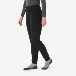 Legginsy trekkingowe damskie polarowe Forclaz MT100. Czarne legginsy damskie QUECHUA, bez wzorów, z dzianiny. Za 59.99 zł.