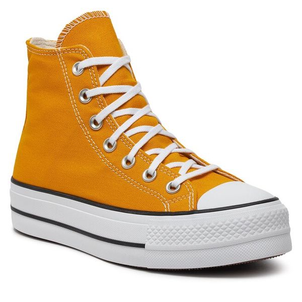 Trampki Converse. Żółte trampki i tenisówki damskie Converse, bez wzorów, bez zapięcia. Za 279.99 zł.