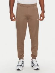 Puma Spodnie dresowe T7 Always On 629588 Brązowy Regular Fit. Brązowe spodnie sportowe męskie Puma, l, bez wzorów, z dresówki. Za 209.99 zł.
