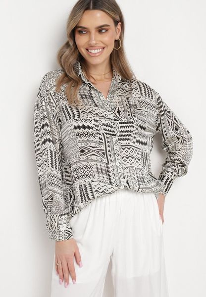 Koszula w paski z ażurowym dołem - wielobarwny. Koszule damskie Sinsay, l, w ażurowe wzory, bez kołnierzyka, bez ramiączek. Za 49.99 zł.