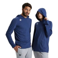Bluza Arena Team Long Sleeve T-Shirt Panel z kapturem. Niebieskie bluzy damskie ARENA, s, bez wzorów, z bawełny, sportowe, bez ramiączek, z kapturem. Za 149.99 zł.