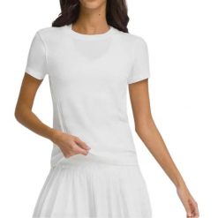 T-shirt Wilson Women's Seamless Pro. Białe t-shirty damskie Wilson, s, bez wzorów, sportowe, bez kołnierzyka, bez ramiączek. W wyprzedaży za 282.30 zł.