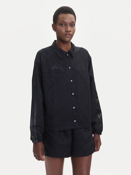 Adidas Kurtka przejściowa Tiro x Common Goal Coaches JL7647 Czarny Loose Fit. Czarne kurtki damskie Adidas, xs, bez wzorów, z syntetyku, bez kaptura. Za 309.99 zł.