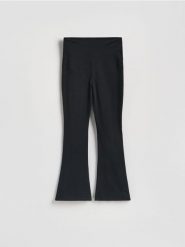 Legginsy flare - czarny. Czarne legginsy damskie Reserved, bez wzorów, z bawełny. Za 89.99 zł.