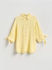 Muślinowa koszula - jasnożółty. Żółte koszule damskie Reserved, l, bez wzorów, z bawełny, bez kołnierzyka, bez ramiączek. Za 109.99 zł.