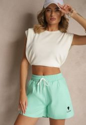 Jasnozielone Klasyczne Szorty Dresowe z Kieszeniami Wiązane w Pasie Folenelle. Zielone szorty damskie Renee, bez wzorów, z dresówki, eleganckie. Za 39.99 zł.