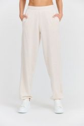 JUICY COUTURE Damskie beżowe spodnie dresowe Davidson Gold. Brązowe spodnie dresowe damskie Juicy Couture, bez wzorów, z bawełny, długie. W wyprzedaży za 259.99 zł.