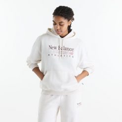 Bluza damska New Balance WT6288NOLIT - biała. Białe bluzy damskie New Balance, m, bez wzorów, z bawełny, klasyczne, bez ramiączek, bez kaptura. Za 299.99 zł.