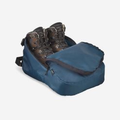Pokrowiec na buty turystyczne i trekkingowe. Niebieskie obuwie trekkingowe damskie FORCLAZ, bez zapięcia. Za 34.99 zł.