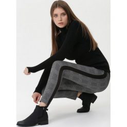 Czarne Spodnie Geraldine. Czarne spodnie dresowe damskie Born2be, bez wzorów, długie, climacool (adidas). Za 49.99 zł.
