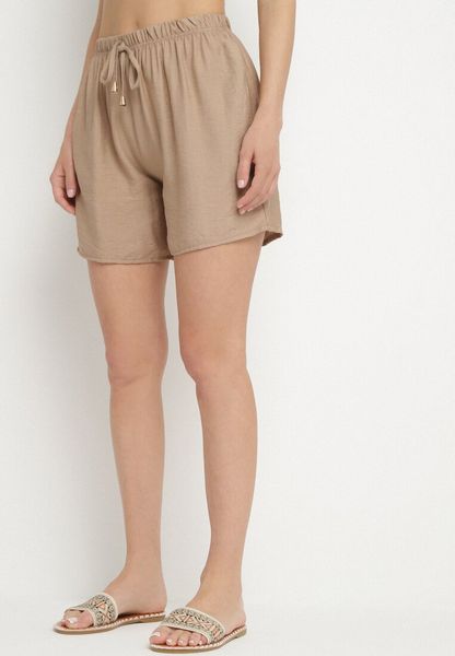 Ciemnobeżowe Bawełniane Szorty z Wysokim Stanem Ozdobione Wiązaniem Filomira. Brązowe szorty damskie Born2be, bez wzorów, z bawełny, z podwyższonym stanem. Za 39.99 zł.