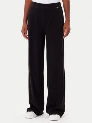 Guess Spodnie dresowe O4BB02 K7611 Czarny Regular Fit. Czarne spodnie dresowe damskie Guess, z aplikacjami, z bawełny. Za 159.99 zł.