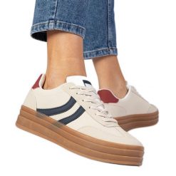 Beżowe sneakersy trampki damskie z granatowym dodatkiem białe. Białe trampki i tenisówki damskie bez wzorów, z syntetyku, przed kostkę, bez zapięcia. Za 96.19 zł.