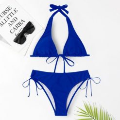 Bikini wiązane na szyję do plażowania Trien. Czarne bikini Intica, bez wzorów, z materiału. W wyprzedaży za 129.00 zł.