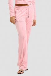 JUICY COUTURE Różowe damskie spodnie dresowe Tina Trackpants. Czerwone spodnie dresowe damskie Juicy Couture, bez wzorów, z dresówki. W wyprzedaży za 346.99 zł.