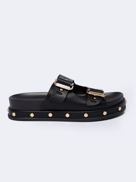 Klapki damskie na podwyższonej podeszwie czarne NN274082 906. Czarne klapki damskie BIG STAR, bez wzorów, z jeansu, eleganckie, bez obcasa, bez zapięcia. W wyprzedaży za 139.99 zł.