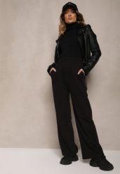Czarne Spodnie Dresowe High Waist z Bawełny z Szerokimi Nogawkami i Polarową Wyściółką Senilora. Czarne spodnie dresowe damskie Renee, bez wzorów, z bawełny, eleganckie, z podwyższonym stanem. Za 69.99 zł.