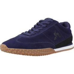 Buty LE COQ SPORTIF VELOCE I Niebieski. Niebieskie buty zimowe męskie le coq sportif, bez wzorów, z tkaniny, bez obcasa, bez zapięcia. W wyprzedaży za 317.65 zł.