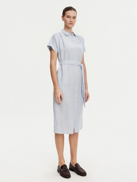 Tommy Hilfiger Sukienka koszulowa Ess WW0WW44653 Błękitny Regular Fit. Niebieskie sukienki damskie Tommy Hilfiger, bez wzorów, ze lnu, bez kołnierzyka, bez ramiączek, koszulowe. Za 489.99 zł.