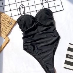 Strój kąpielowy z cienkimi ramiączkami na plażę i basen Tahmina. Stroje kąpielowe damskie Intica, l, bez wzorów. Za 149.00 zł.