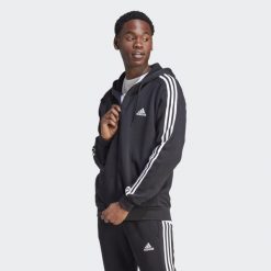Bluza z kapturem Essentials Fleece 3-Stripes Full-Zip. Szare bluzy męskie Adidas, m, bez wzorów, z materiału, z kapturem, na fitness i siłownię. Za 237.00 zł.