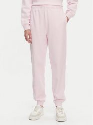 Tommy Hilfiger Spodnie dresowe WW0WW45576 Różowy Regular Fit. Czerwone spodnie dresowe damskie Tommy Hilfiger, bez wzorów, z bawełny. Za 309.99 zł.