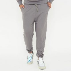 Spodnie sportowe unisex F BALLON szare. Szare buty sportowe męskie Legea, bez wzorów, z gumy, na fitness i siłownię. W wyprzedaży za 92.00 zł.