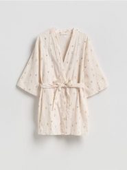 Szlafrok z lnem - kremowy. Białe szlafroki damskie Reserved, l, bez wzorów, z tkaniny, bez ramiączek, bez kaptura. Za 149.99 zł.