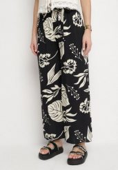 Czarne Spodnie w Kwiaty o Szerokim Kroju z Gumką i Paskiem Eledina. Czarne spodnie materiałowe damskie Born2be, bez wzorów, z jeansu, eleganckie. Za 49.99 zł.
