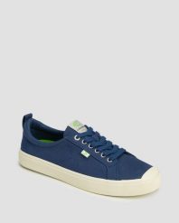 Tenisówki Cariuma OCA Low Shadow Blue Canvas Unisex. Niebieskie trampki i tenisówki damskie CARIUMA, bez wzorów, z gumy, bez zapięcia. Za 215.25 zł.