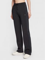 Guess Spodnie dresowe V3RB21 K7UW2 Granatowy Regular Fit. Niebieskie spodnie dresowe damskie Guess, z aplikacjami, z dresówki. Za 239.99 zł.