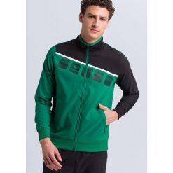 Kurtka prezentacyjna Erima 5-C. Czarne kurtki sportowe męskie Erima, m, bez wzorów, bez kaptura, na fitness i siłownię. W wyprzedaży za 201.45 zł.