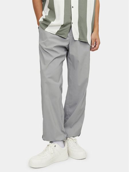 Jack & Jones Spodnie dresowe Karl 12253040 Szary Loose Fit. Szare spodnie sportowe męskie Jack & Jones, m, bez wzorów, z dresówki. Za 99.99 zł.