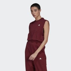 Koszulka damska Adidas Move Studio krótka top bordowa. Czerwone bluzki damskie Adidas, xs, bez wzorów, z bawełny, sportowe, bez kołnierzyka, bez ramiączek. Za 92.00 zł.