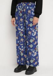 Niebieskie Spodnie z Bawełny z w Stylu Boho z Szerokimi Nogawkami i Gumką w Talii Jelvia. Niebieskie spodnie materiałowe damskie Born2be, na lato, bez wzorów, z bawełny, boho. Za 39.99 zł.