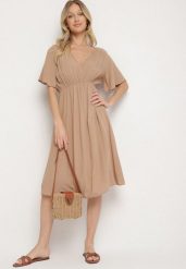 Ciemnobeżowa Bawełniana Sukienka o Rozkloszowanym Fasonie Liranelle. Brązowe sukienki damskie Born2be, na co dzień, na lato, l, bez wzorów, z bawełny, eleganckie, bez kołnierzyka, bez ramiączek, midi, rozkloszowane. Za 49.99 zł.