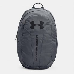 Plecak sportowy szkolny Under Armour Hustle Lite - 1364180-012. Szare plecaki męskie Under Armour, bez wzorów, sportowe. Za 117.99 zł.