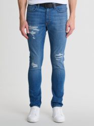 Jeansy męskie skinny z przetarciami niebieskie Deric 247. Niebieskie jeansy męskie BIG STAR, z denimu, eleganckie. W wyprzedaży za 249.99 zł.