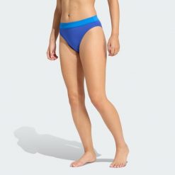 Figi Optimé Aqua Mid-Waist Bikini. Niebieskie stroje kąpielowe damskie Adidas, bez wzorów. Za 109.00 zł.