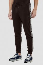 GUESS Brązowe męskie spodnie dresowe z lampasami New Arlo. Brązowe spodnie sportowe męskie Guess, m, z aplikacjami, z dresówki. W wyprzedaży za 286.99 zł.