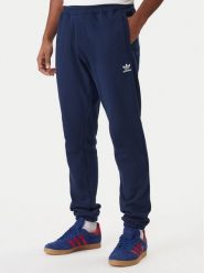 Adidas Spodnie dresowe Trefoil Essentials JD2423 Granatowy Slim Fit. Niebieskie spodnie sportowe męskie Adidas, m, bez wzorów, z bawełny. Za 239.99 zł.