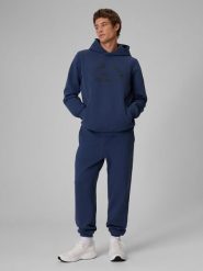 4F Spodnie dresowe joggery męskie - granatowe M. Niebieskie spodnie materiałowe męskie 4F, bez wzorów, z dresówki. Za 179.99 zł.