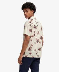 Superdry Koszula Cabana Poolside krótki rękaw z bawełny organicznej. Białe koszule damskie Superdry, na lato, l, bez wzorów, z bawełny, eleganckie, bez kołnierzyka, bez ramiączek. Za 223.50 zł.