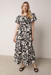 Czarna Rozkloszowana Sukienka z Wiskozy z Bufiastymi Rękawami w Roślinny Wzór Semea. Czarne sukienki damskie Born2be, do pracy, bez wzorów, z materiału, biznesowe, bez kołnierzyka, bez ramiączek, maxi, proste. Za 89.99 zł.