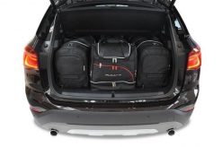 Torby Do Bagażnika Bmw X1 2015-2022 4Szt Kjust. Czarne torby podróżne damskie KJUST, bez wzorów, z kauczuku. Za 1,214.00 zł.