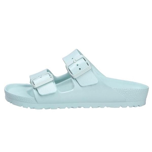 Klapki damskie Birkenstock Arizona Eva. Zielone klapki damskie Birkenstock, na lato, bez wzorów, z materiału, bez obcasa, bez zapięcia. Za 373.00 zł.