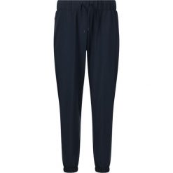 Damskie spodnie dresowe Athlecia Austberg. Niebieskie spodnie dresowe damskie Athlecia, bez wzorów, z dresówki, sportowe, na fitness i siłownię. Za 255.00 zł.