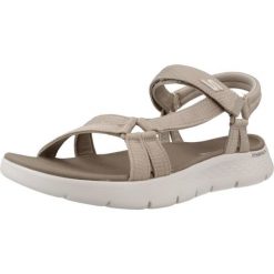 Sandały SKECHERS GO WALK FLEX SANDAL Jasnobrązowy. Brązowe sandały damskie Skechers, bez wzorów, z tkaniny, bez obcasa, bez zapięcia. Za 249.99 zł.