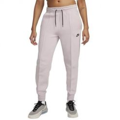 Spodnie sportowe damskie Nike FB8330019. Spodnie dresowe damskie Nike, bez wzorów, z bawełny, sportowe, trekkingowe. Za 465.00 zł.